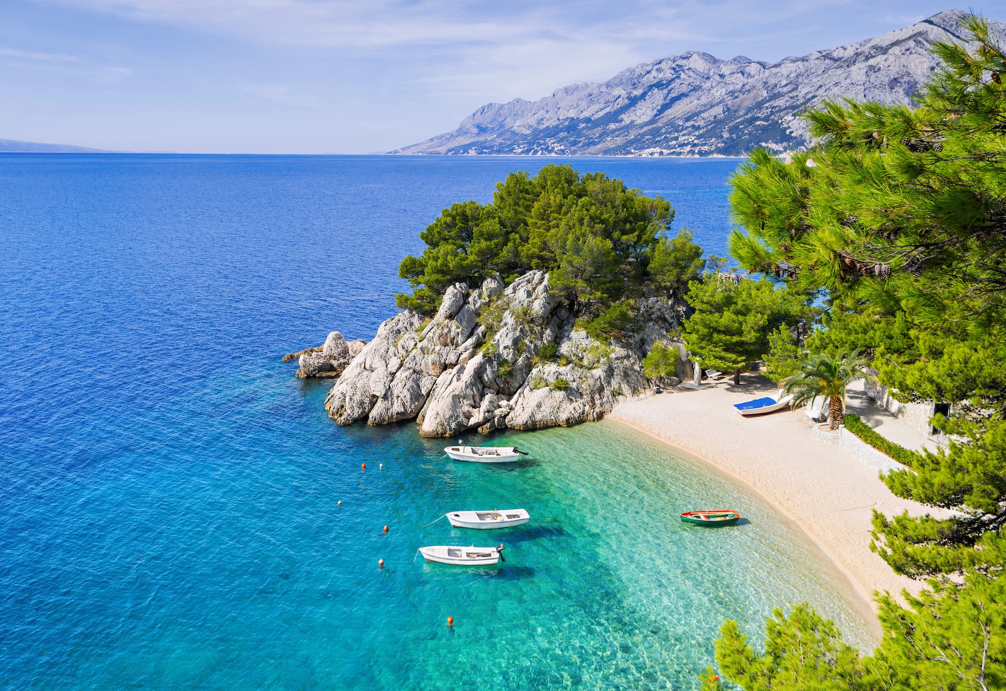Yacht anchored in a Mediterranean cove